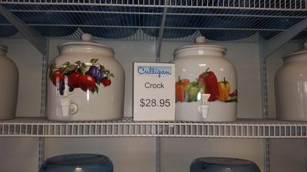 Water crocks shown with lids and 1 price. Awesome clerk called manager but he refused to give me lid.