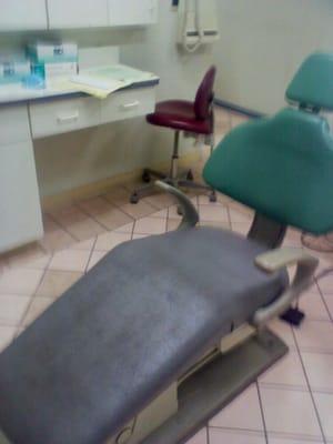 Look at this filthy ass dental chair invest in a new one! Yikes!