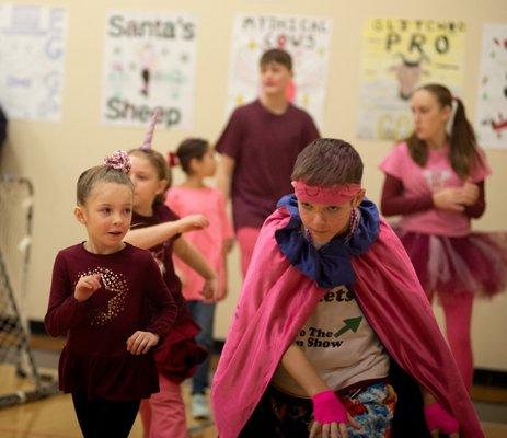 Indoor Olympics teams choose their colors and sport team spirit on the big day.