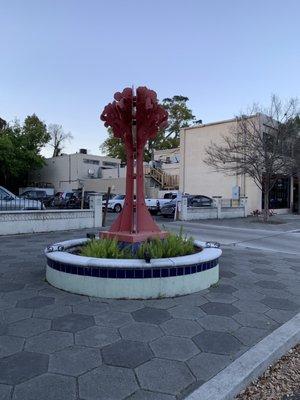 Blue Fish parking behind the artwork