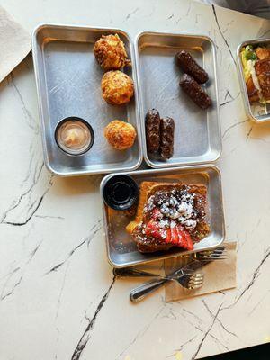 Berry French toast, pork sausage and hash brown bites.