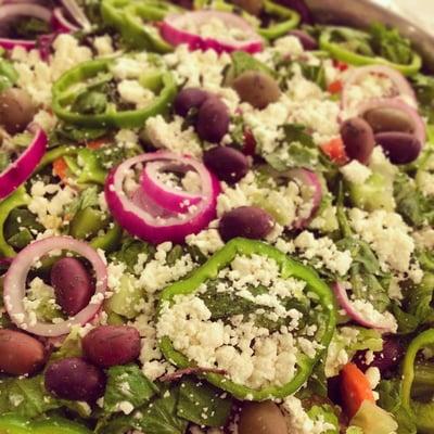 Greek Salad with fresh olives, peppers, red onions and feta cheese!