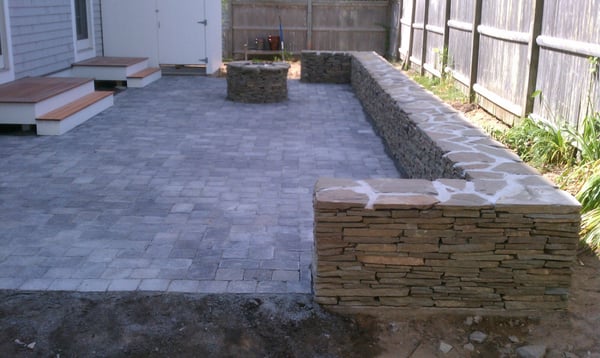 Stone wall, patio and gas firepit