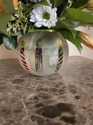 Not the same vase as in web. Appears to be white with candles painted over