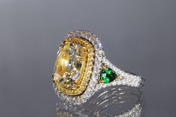 18 karat two-tone natural unheated yellow sapphire and diamond ring