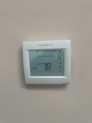 New thermostat installed in a residence.