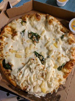 Ordered an Alfredo pizza with pineapple and spinach. There were 2 pieces of spinach & the cheese was all over the place.