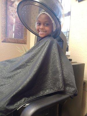 Baby girl under the dryer.