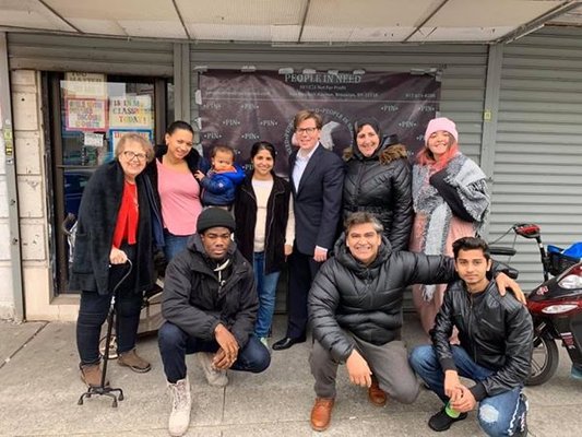 The co-founders of People In Need with Assemblyperson Robert Carroll and other volunteers following the distribution of winter coats (12/19)