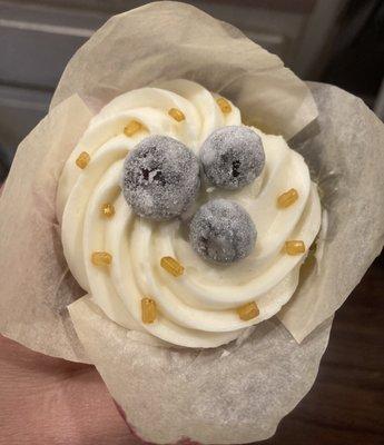 Lemon Blueberry Cupcake: We start with a lemon cupcake and fill it with a homemade blueberry compote. Iced and topped with sugared berries.