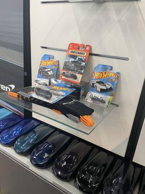 cool replicas of the cars at the dealership.