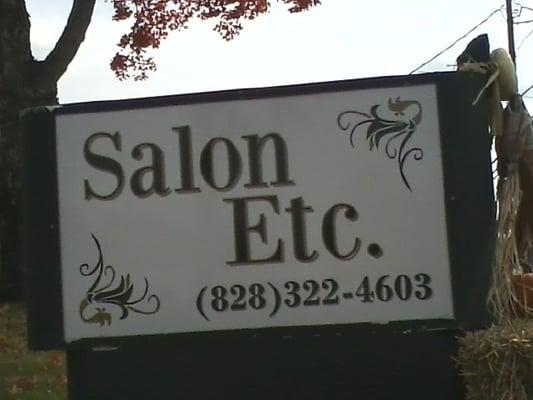 this is the sign at the road, in front of the salon.