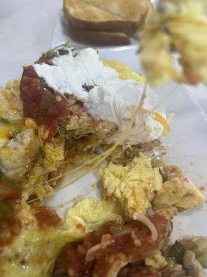 Inside omelet, with stringy cheese