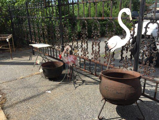 Outdoor yard art and vintage pots and flowers stands; vintage bird baths and out door furniture