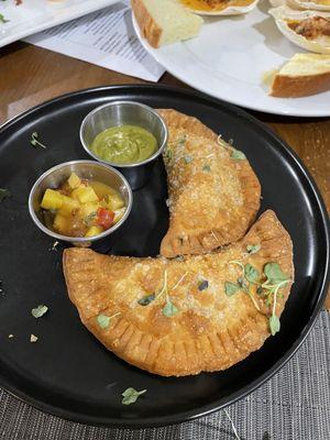 Scallops, Empanadas and melon wrapped with prosciutto