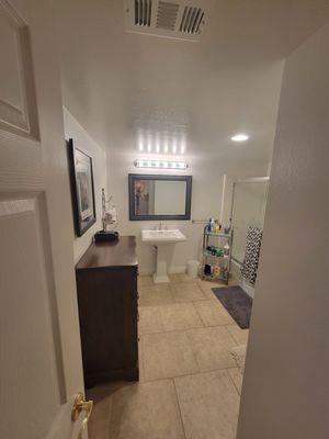 Repainted clients' guest bathroom and updated faucet as well.