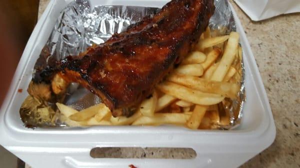 1/2 rack BBQ Ribs dinner withe choice of potato,  soup or salad and bread. $13.10