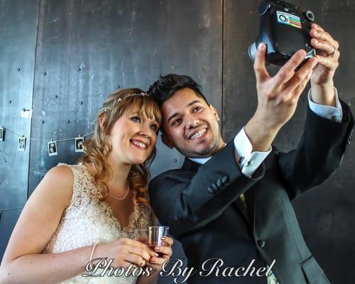 Wedding couple taking a selfie