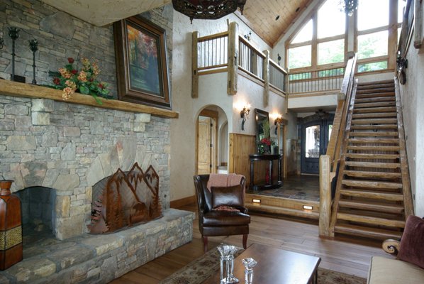 Vintage Timbers, flooring, and stairs. Entry to Parlor