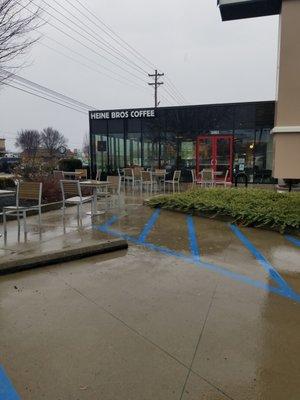 outside handicap parking space and tables blocking access