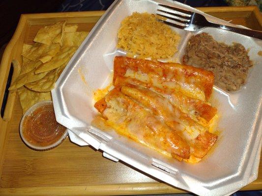 Cheese Enchiladas with Red Sauce, Refried Beans, Rice, Fresh Chips, and Warm Salsa