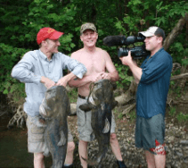 Fred Berry holding a catfish