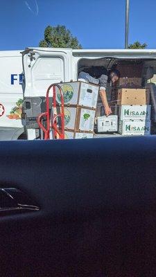 An employee at cooley Mediterranean market