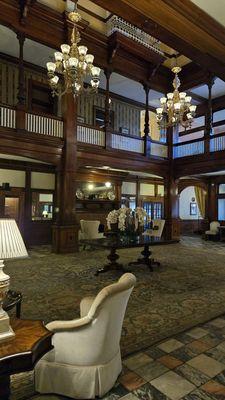 Three-story open atrium lobby.