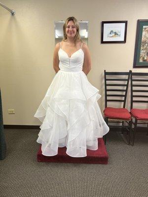 The wedding dress had done shoulder straps, sides, front adjustment, and 4 bustles.