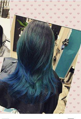 Balayage teal colors with long layers.