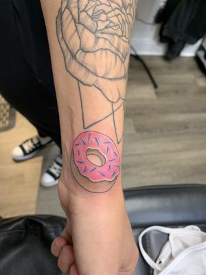 1 of 4 matching donut tattoos done by Clay at The Collective!