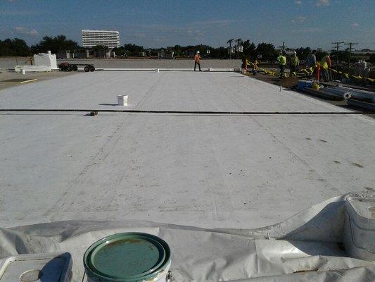 TPO Roof coating using Firestone products improves insulation and reflects heat