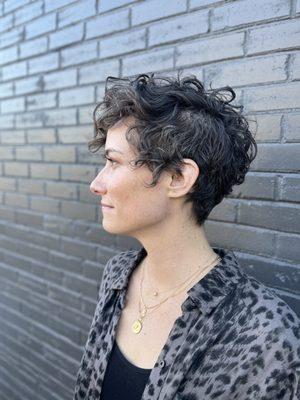 Curly pixie cut by Jessica R.  Instagram: @jrodriguezpro