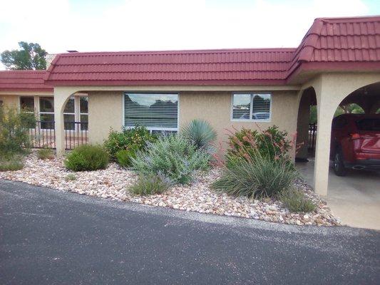 Xeriscape, deer resistant plants and 2-4 in. Texas Stone.