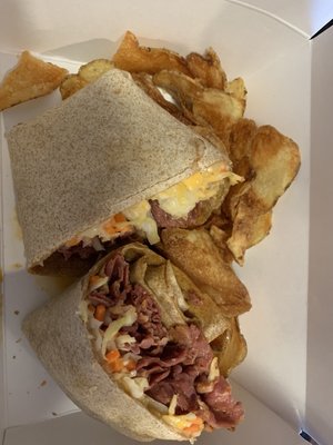 The Rachel: Grilled pastrami, cole slaw, Russian dressing, Swiss cheese on a wheat wrap