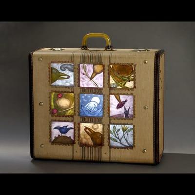 "Fledge Cycle" Illuminated fired glass and suitcase piece