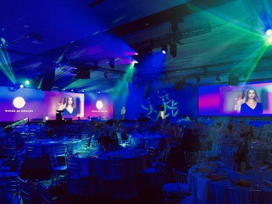 Ultra-wide-screen video system for corporate event