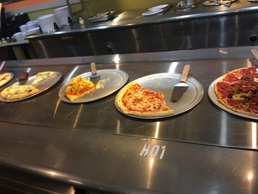 Busy buffet. Can ask for any specialty or regular pizza to be added to buffet.