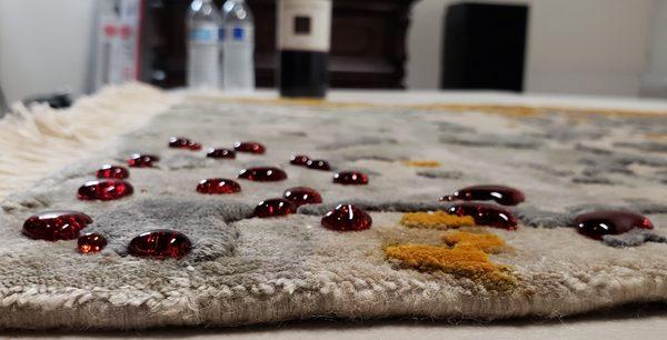 Red Wine on 100% Wool Rug treated with Fiber ProTector applied by The Fiber Protection Specialist