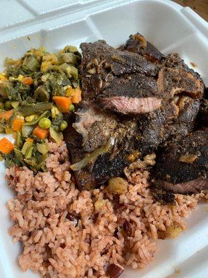 Large jerk pork with cooked greens ($17)