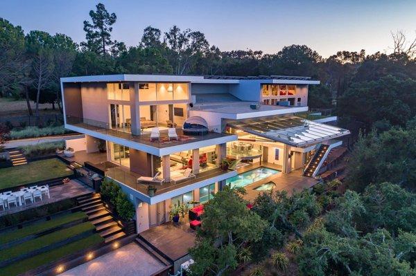 All glass on this house was done by us. Including the aircraft hangar door!