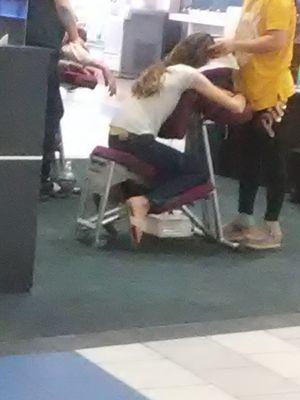 Chair massage at the Asian spa booth