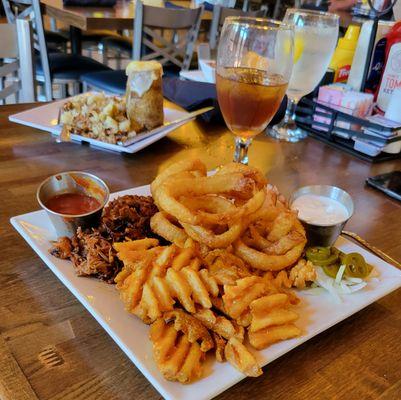 Two Meat Plate with Onion Rings and Waffle Fries.