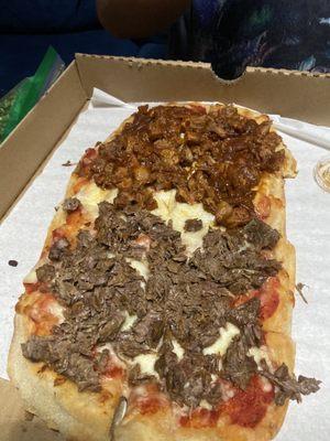 Half asada and half pastor pizza. The meat was excellent!