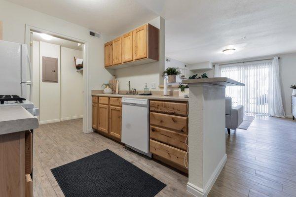 Galley style kitchen with breakfast bar