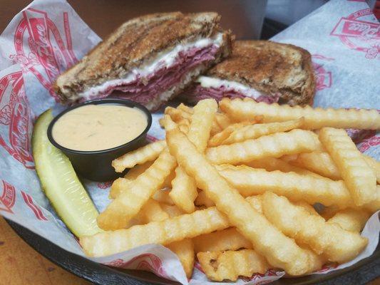 March special... Reuben & Fries...Thinly house shaved corned beef, sauerkraut, and creamy melted swiss cheese or marble rye.