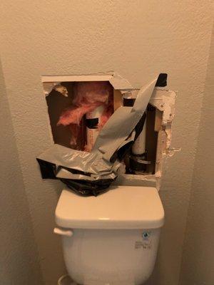 Hole that was behind our toilet for 2 weeks