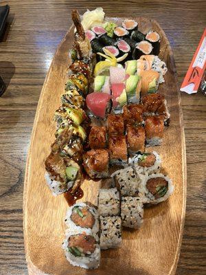 Dragon Roll (left), Spicy Tuna Roll (bottom), Downtown Roll (2nd from bottom), Rainbow roll (3rd from bottom), Salmon and Tuna Rolls (top 2)