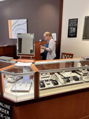 Jewelry cleaning and inspection for lifetime diamond warranty.