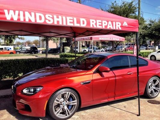 Windshield repair shop set up at HEB gas station.